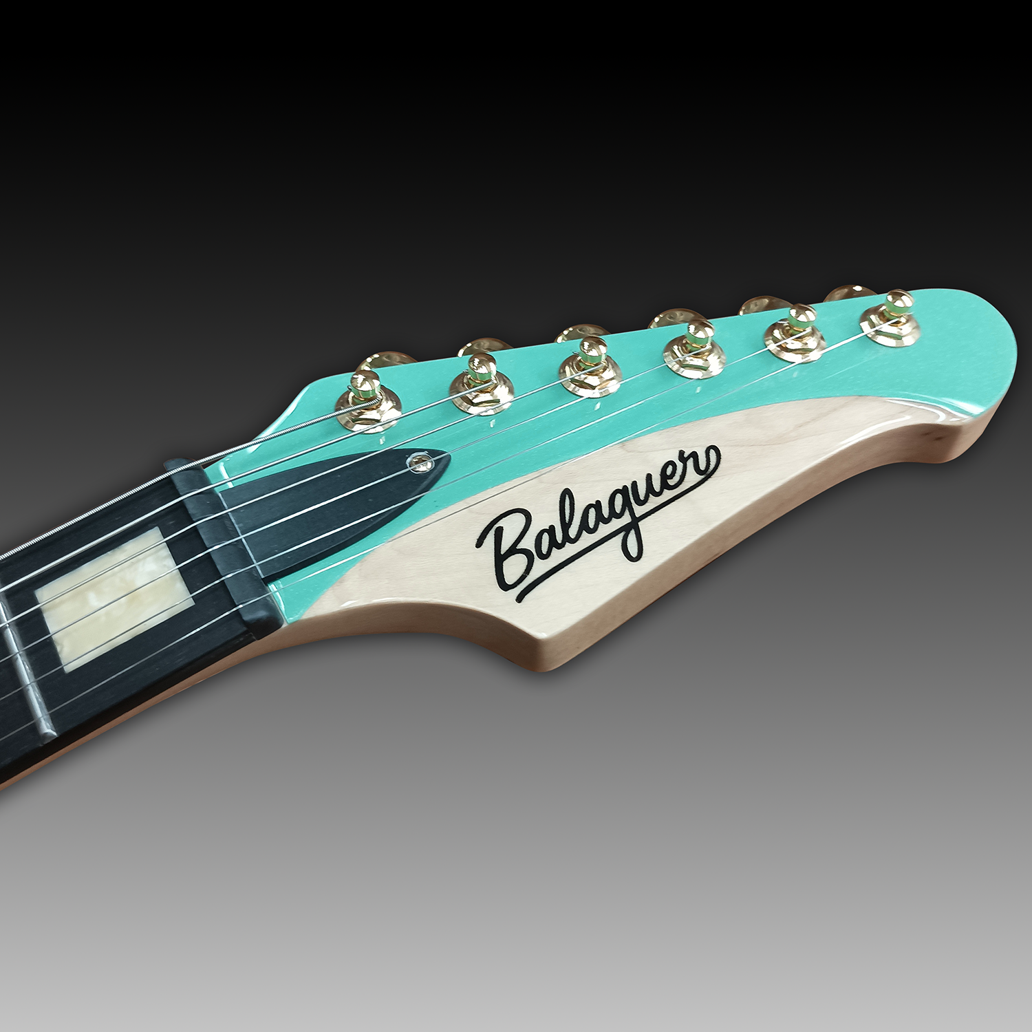 the_espada_t-bar_headstock.png