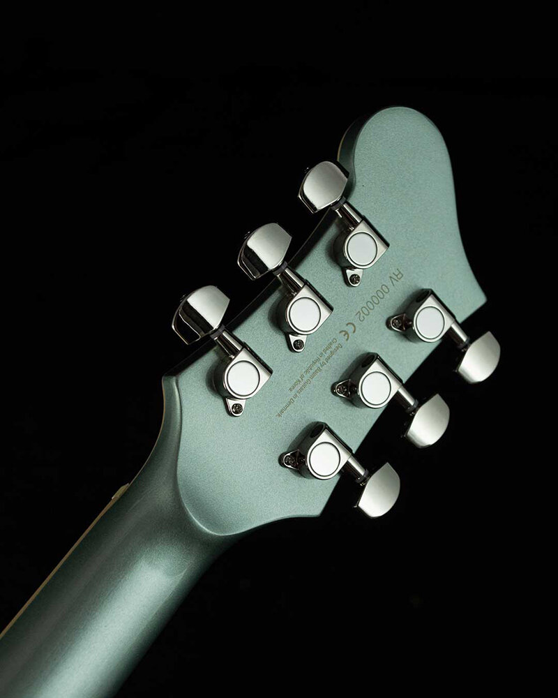 revolt_with_bigsby_ocean_mist_headstock_back.jpg