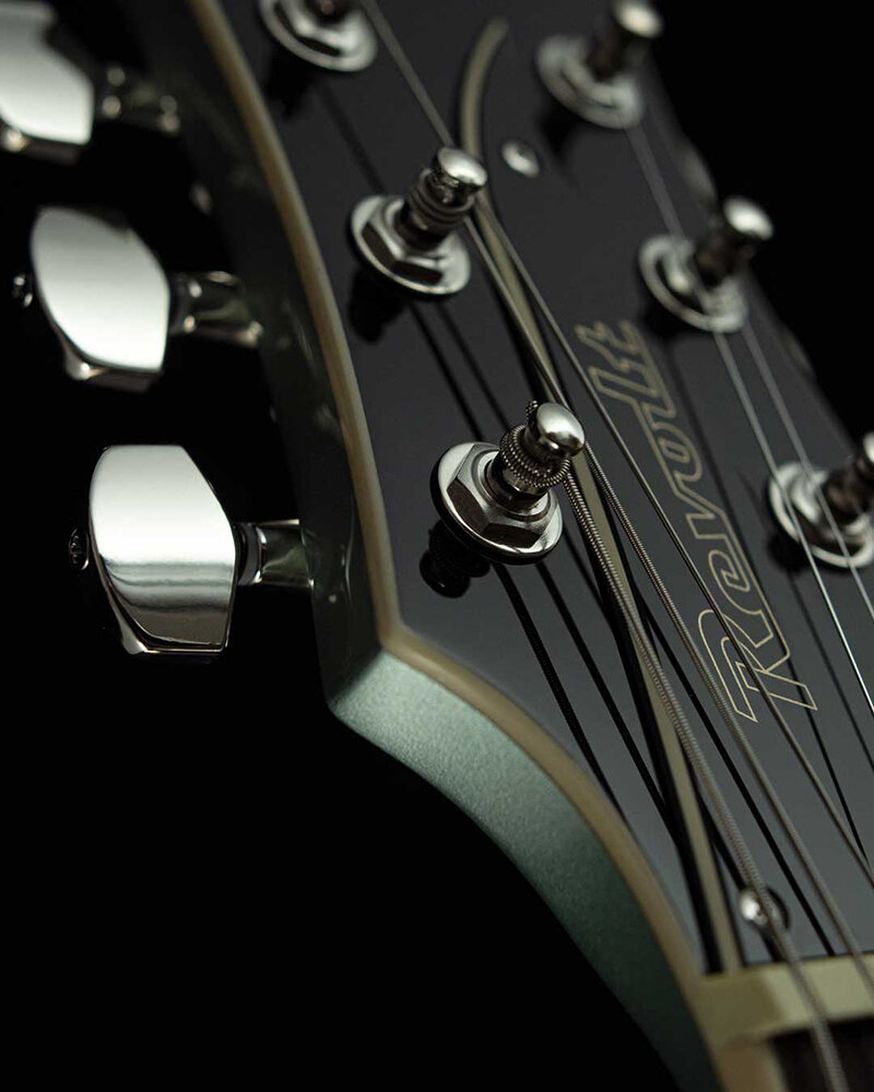 revolt_with_bigsby_ocean_mist_tuner_headstock.jpg